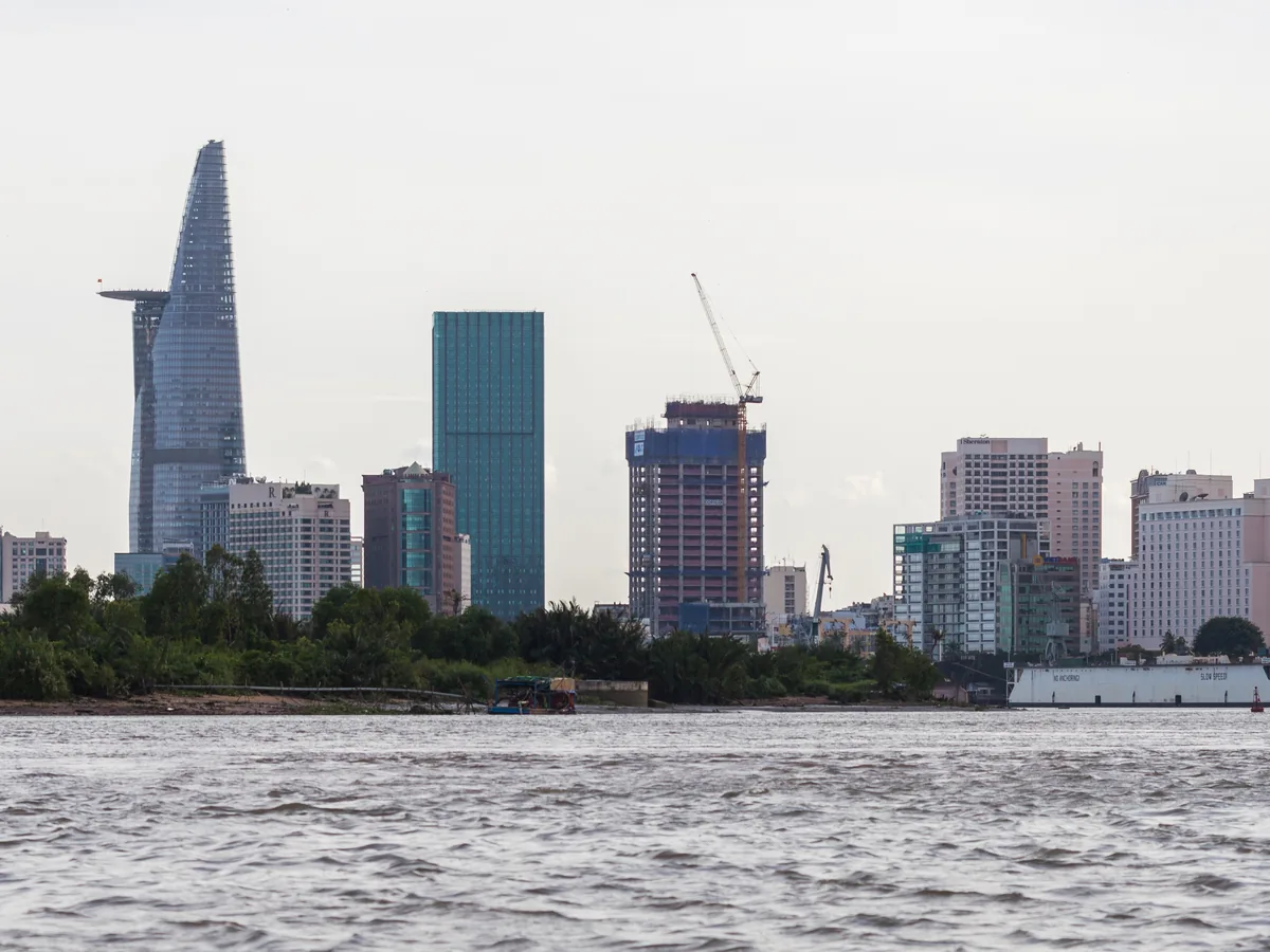 The Saigon River and skyline of Ho Chi Minh City